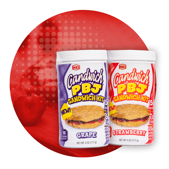 Two cans of sandwich cookies are sitting in front of a red background.